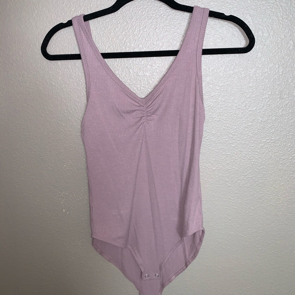 Purple body suit